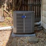 Outdoor American Standard air conditioning condenser installation